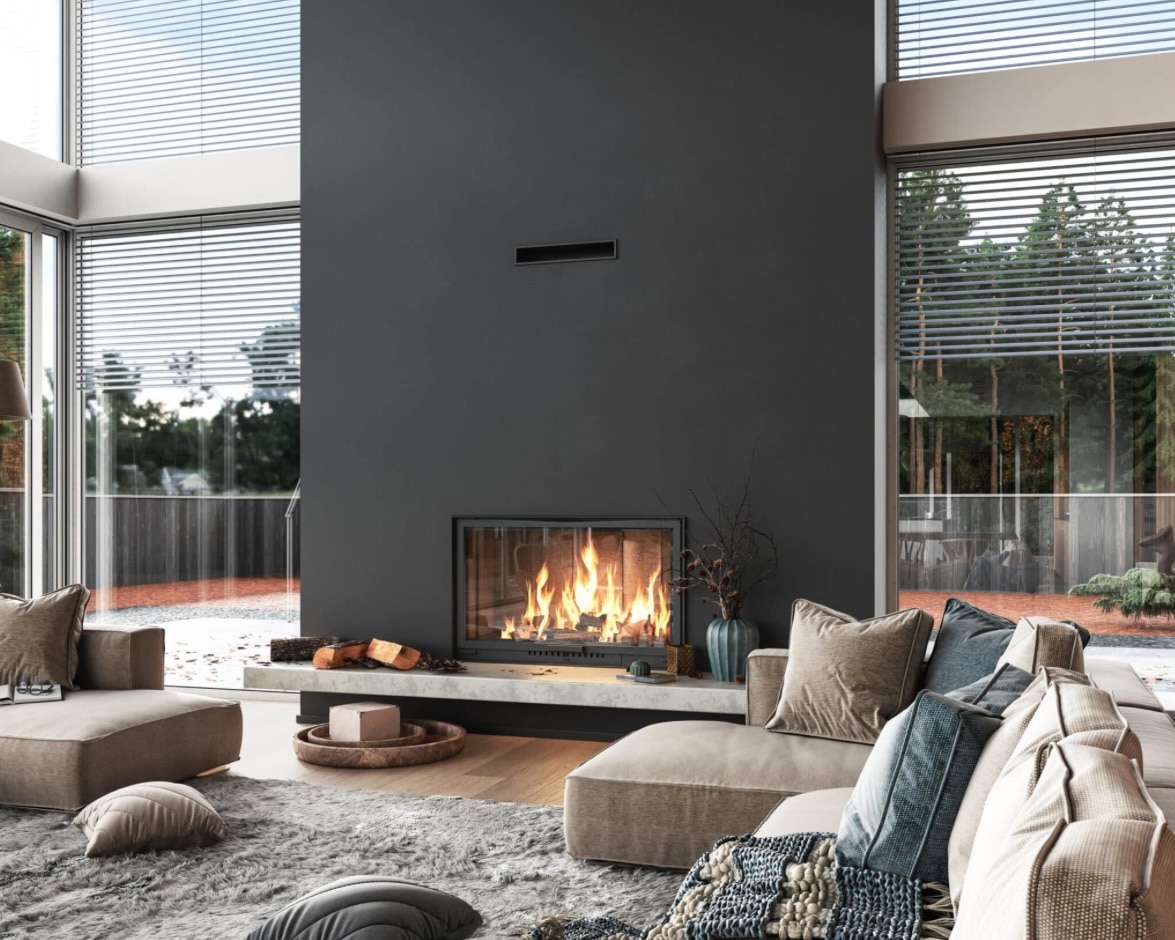 Black living room with dark walls, velvet sofa and warm lighting