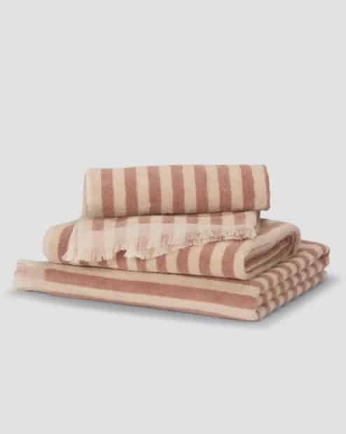 Piglet in Bed Pembroke Stripe cotton towels in warm stripes on a bathroom towel rail