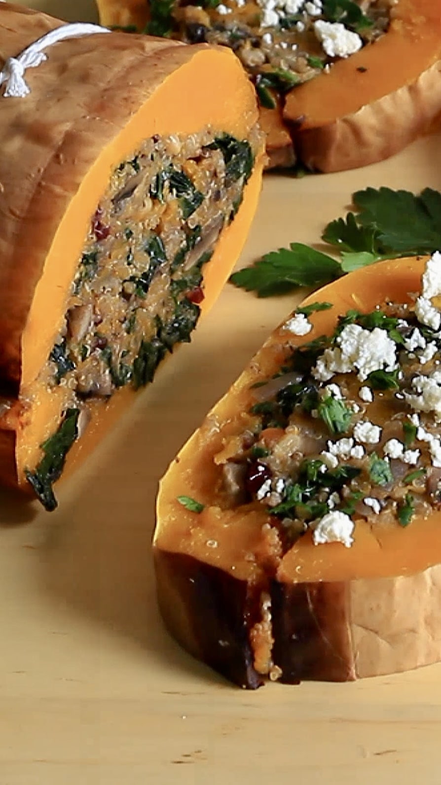 Sweet roasted squash filled with a savoury grain, spinach and mushroom stuffing, finished with feta and herbs – an easy vegetarian or vegan centrepiece for cosy evenings.