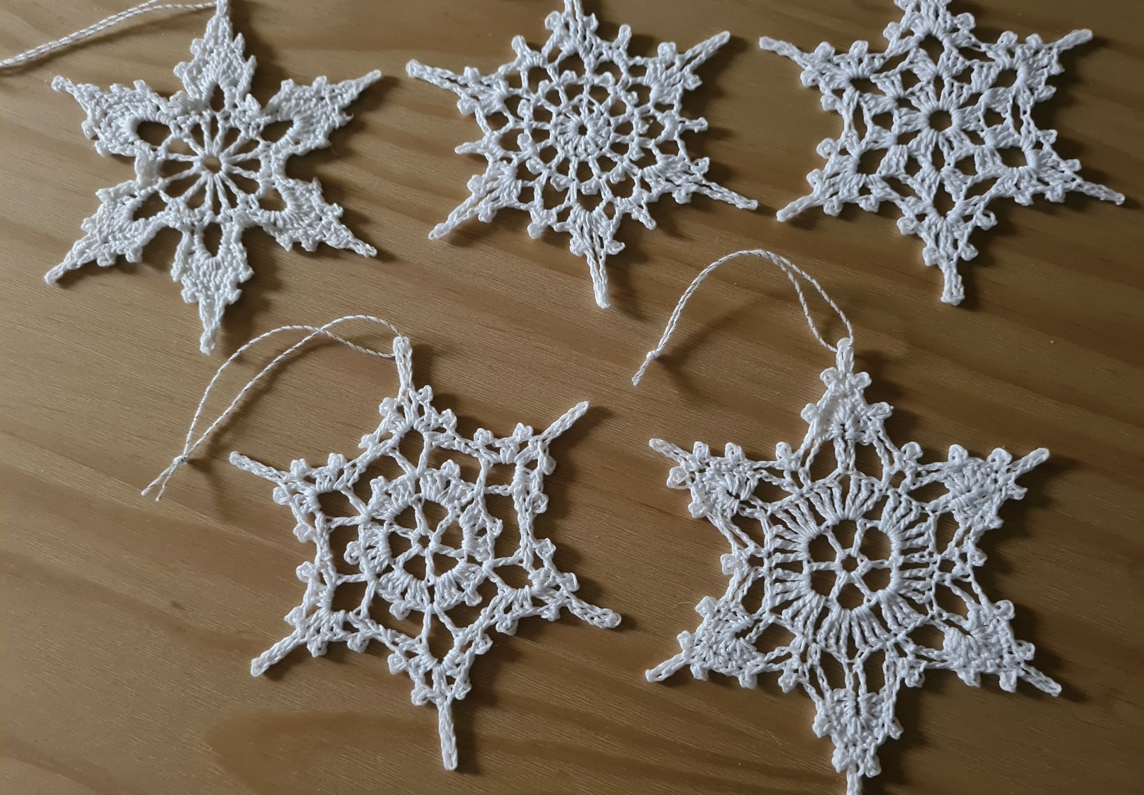 White crochet snowflake decorations