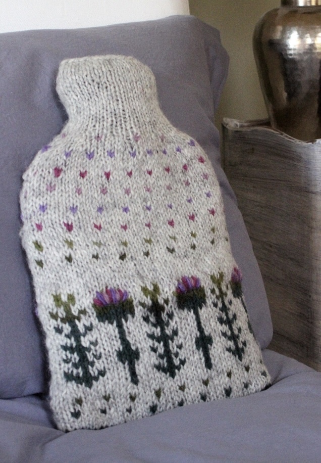 Knitted thistle hot water bottle cover by PachamamaWoollies