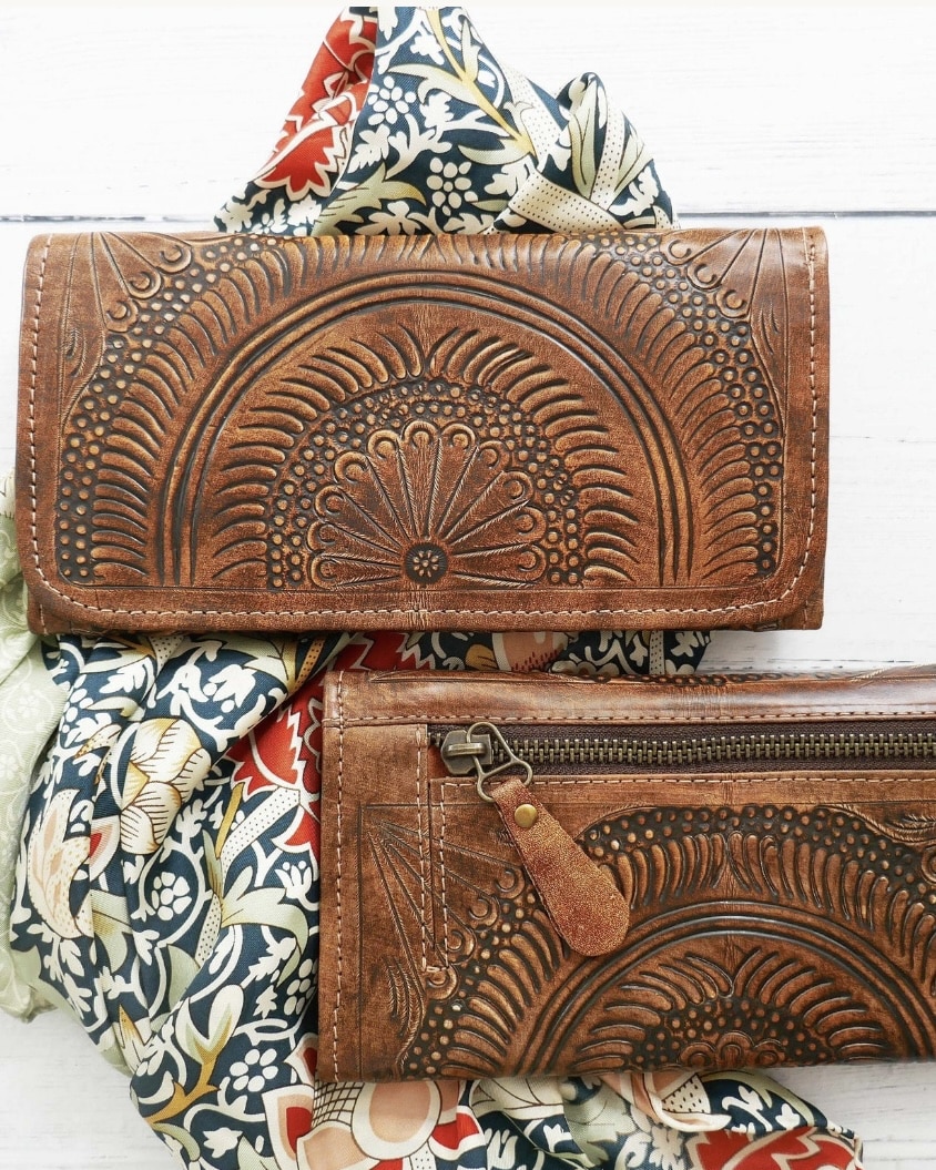 Hand-tooled tan leather wallet and purse with fan motif