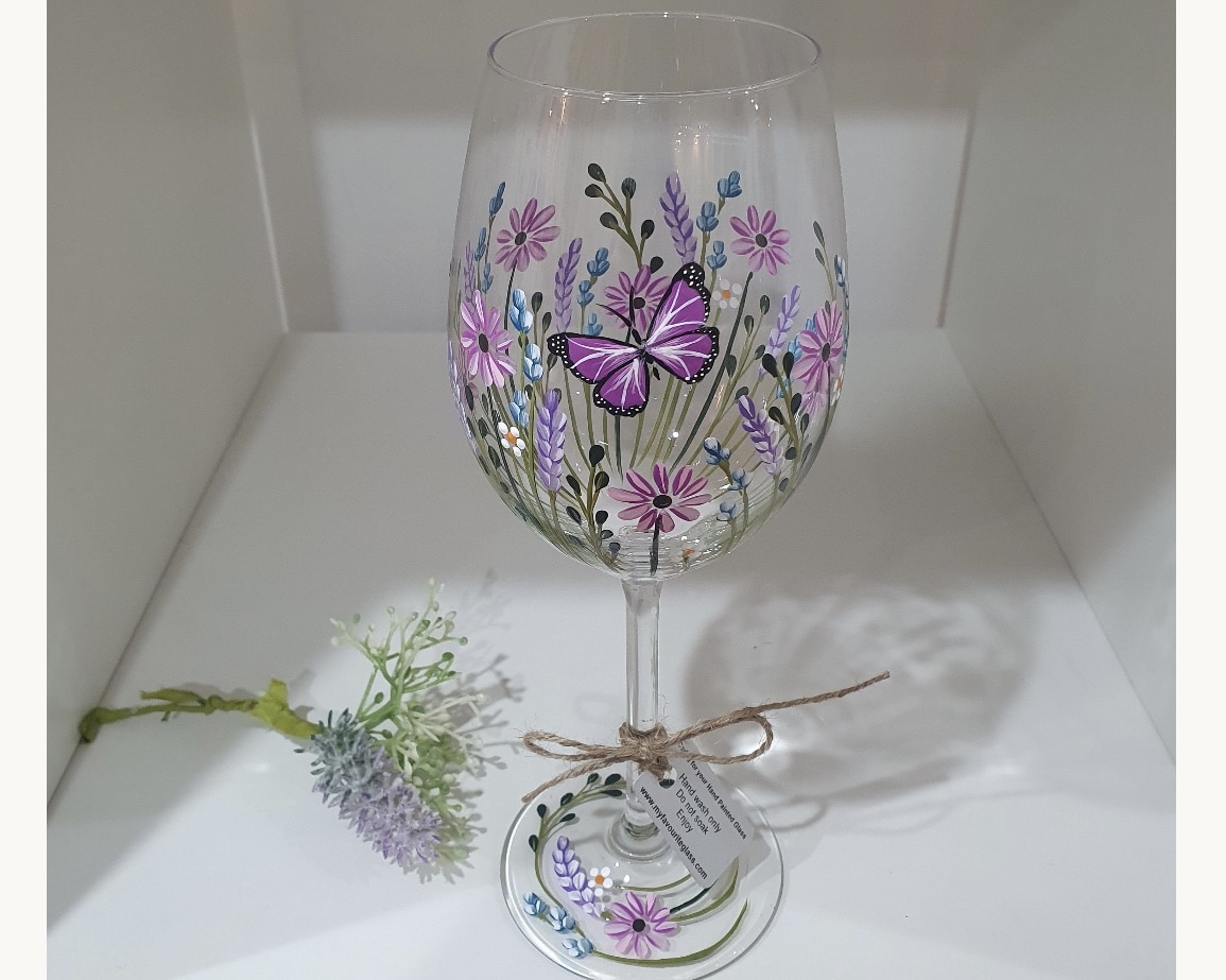 Hand-painted floral wine glass from an independent maker