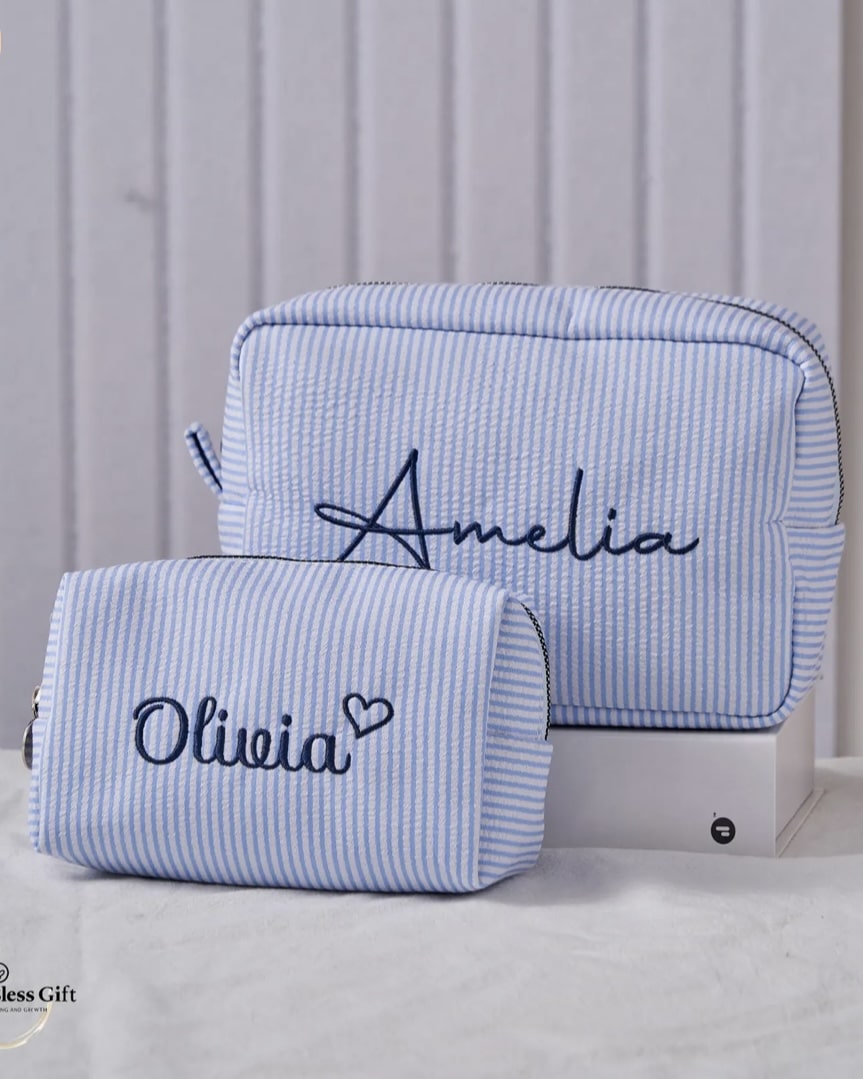 Blue seersucker monogrammed makeup and toiletry bags