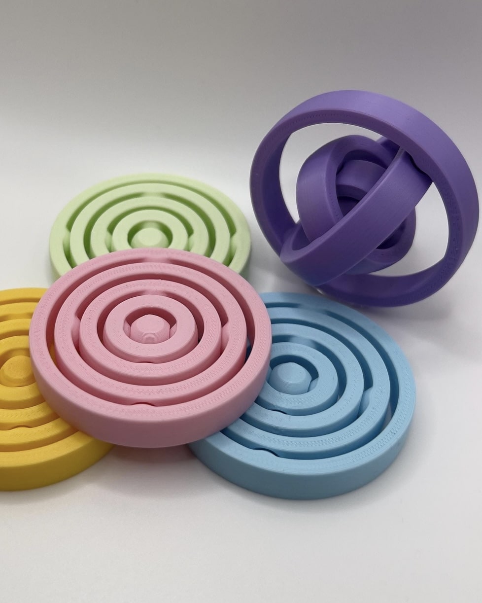 Air spinner fidget toy discs in pastel colours