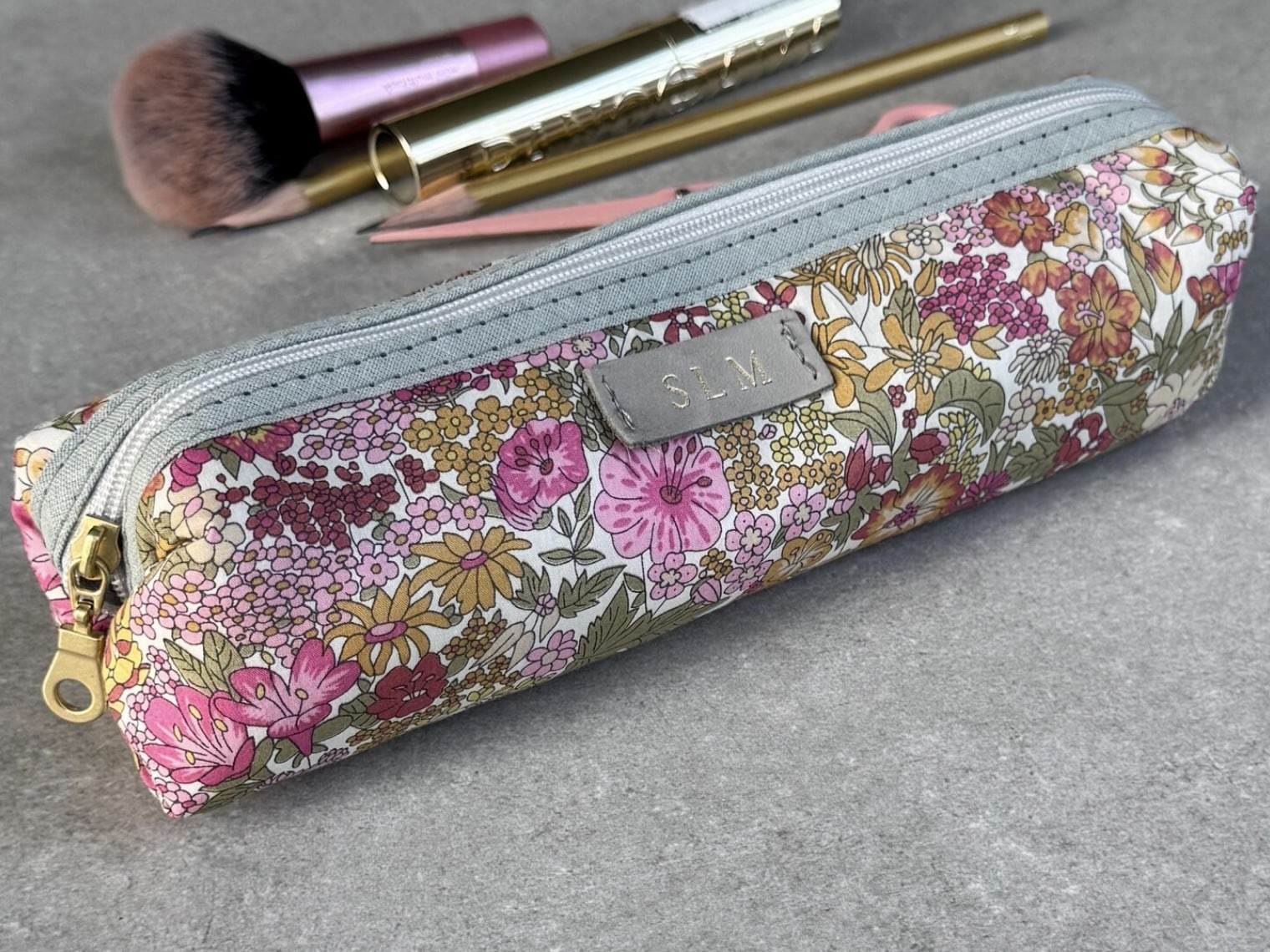 Liberty print stocking fillers laid out on a table