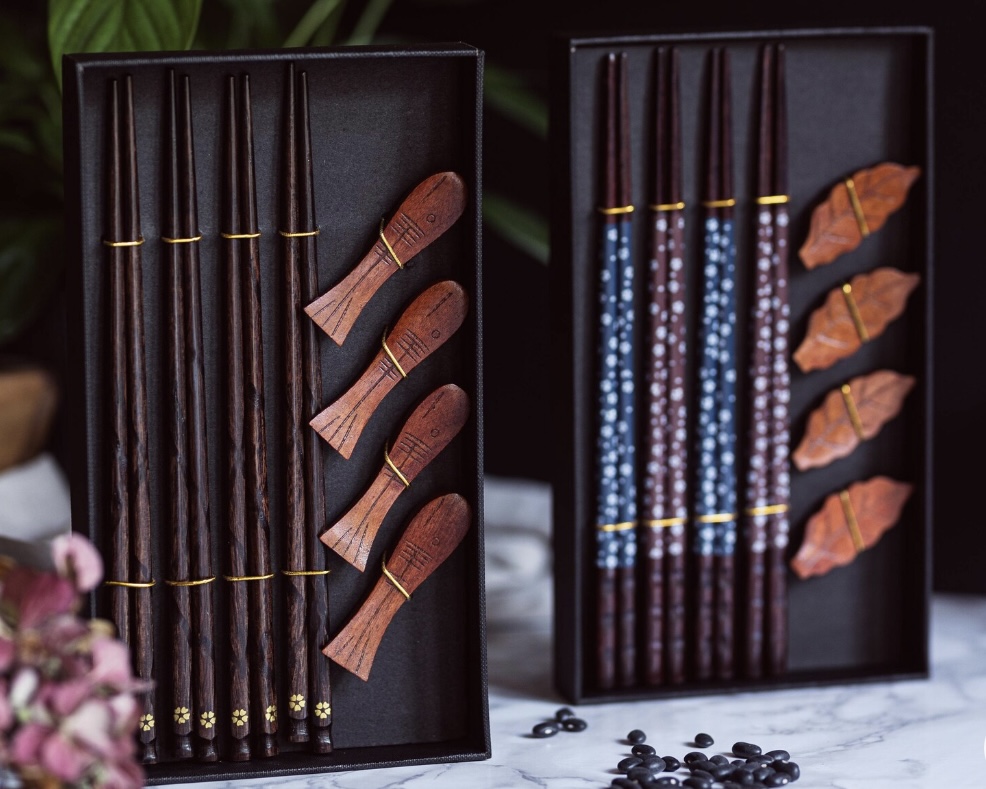 Japanese style wooden chopsticks and rests in a gift box