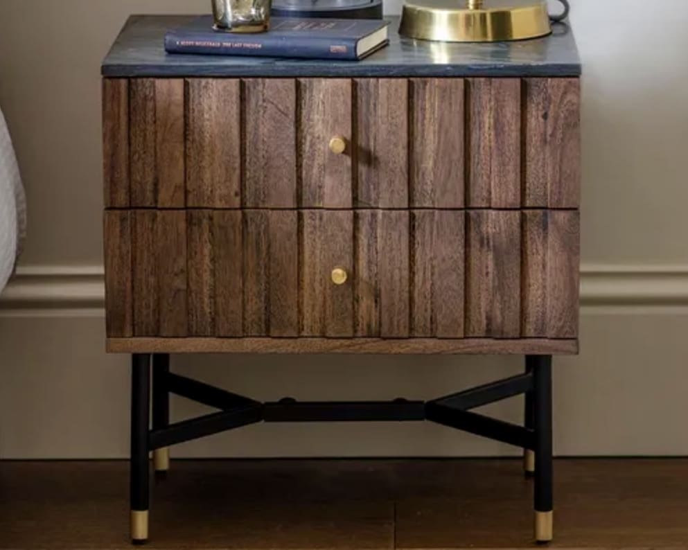 Wood bedside table with dark marble top and brass details