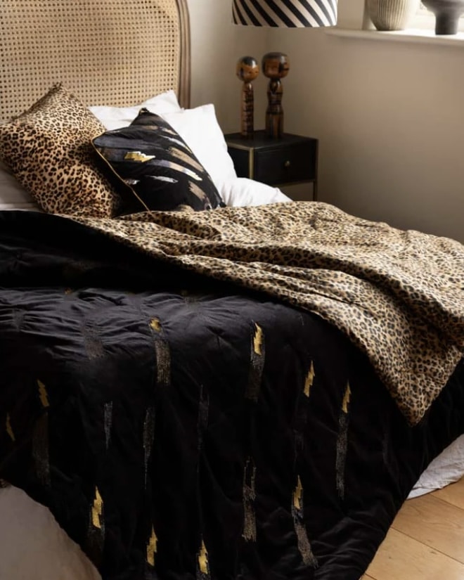 beige and black bedroom – Cocoa leopard print quilt in king size on dark bed