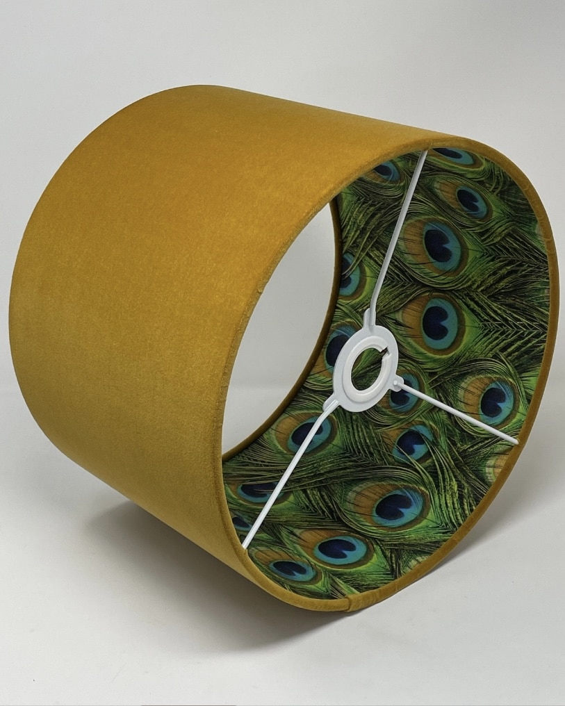 Mustard velvet drum lampshade with peacock-feather lining