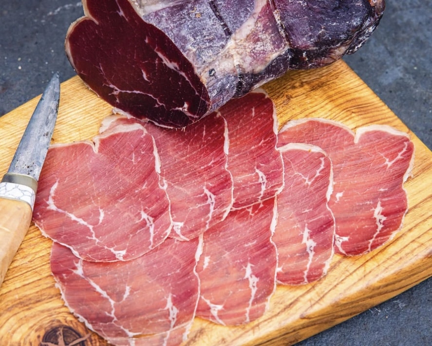Charcuterie board ideas with Shropshire Bresaola – British air-dried beef on a wooden serving board