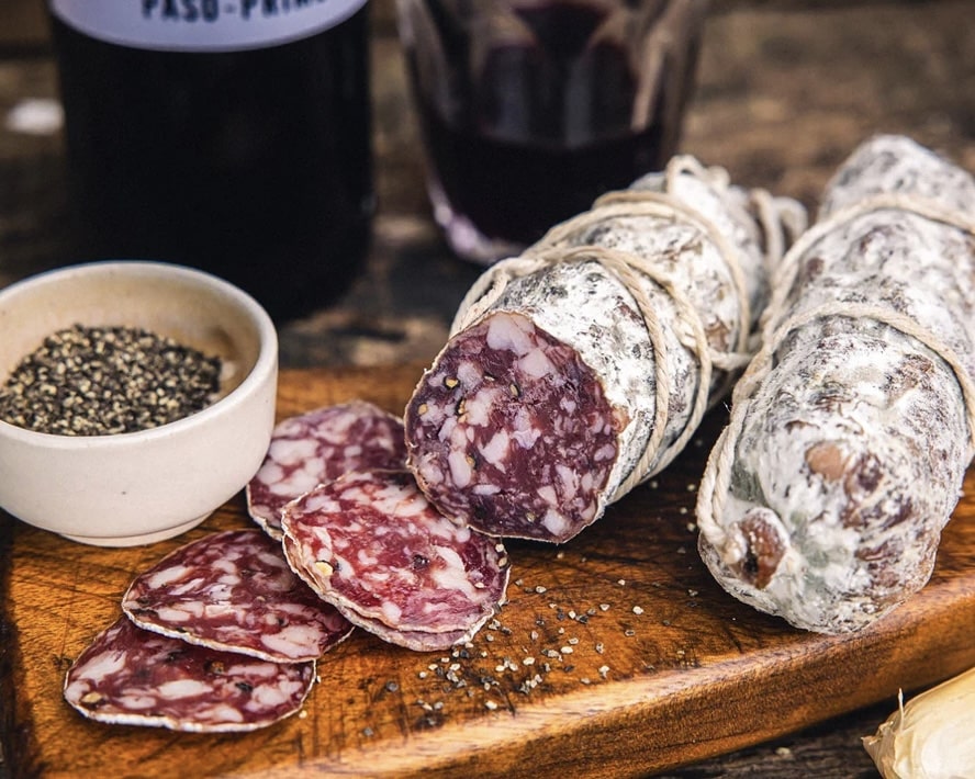 Classic Shropshire salami sliced on a wooden board – easy charcuterie board ideas with salami