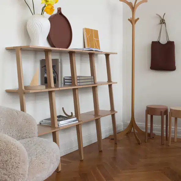 Swedese Libri ladder-style designer bookcase in light wood finish, a space-saving designer bookcase for small rooms