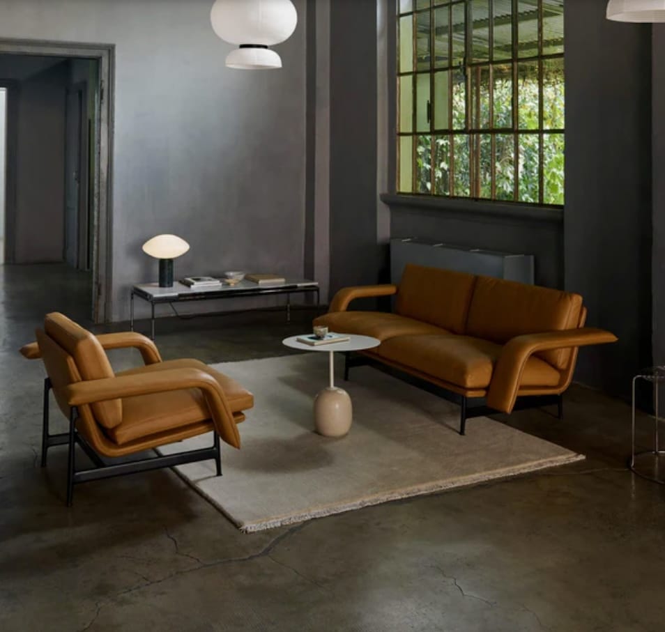 tan leather sofa with charcoal walls, pale neutral rug and black metal frame – &Tradition Meantime at Holloways of Ludlow