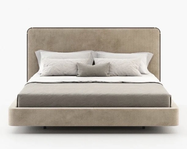 Beige upholstered bed and headboard in a modern beige and black bedroom