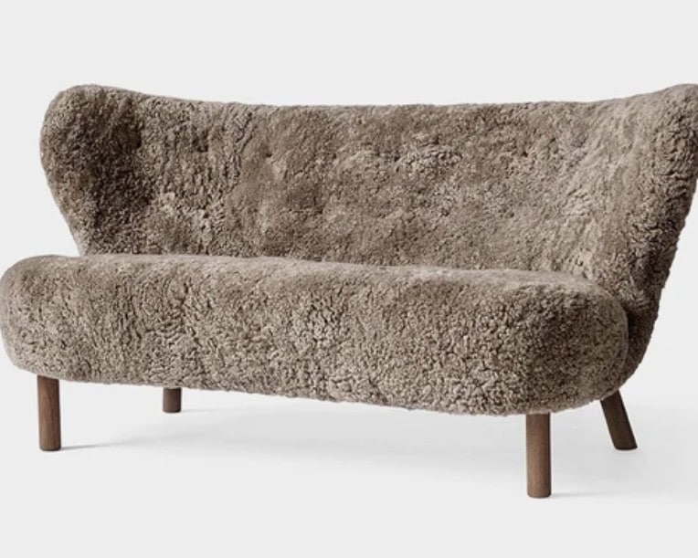 Bouclé sofa in warm neutral tone