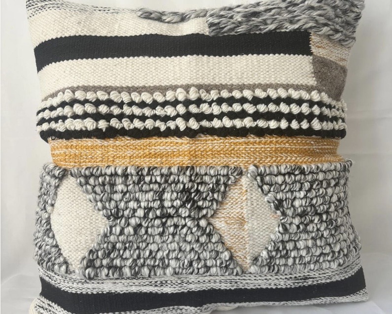 Textured cushion styling for a black living room, black living room ideas