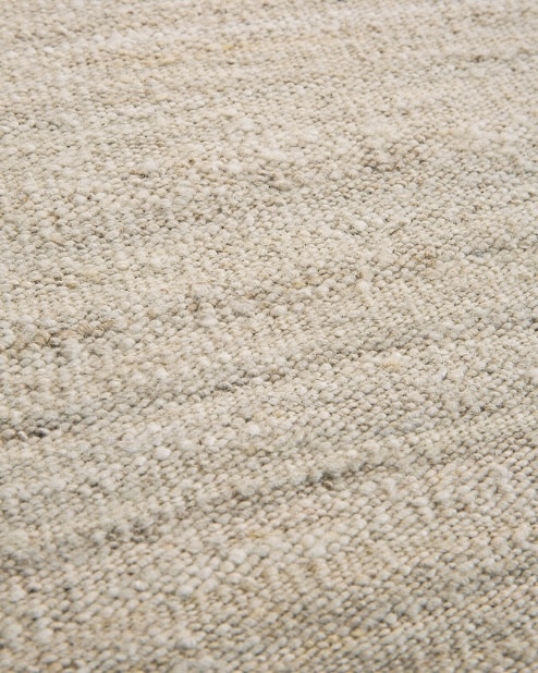 Chic boho bedroom rug idea: Ethnicraft Sand Nomad kilim rug in a warm neutral weave.