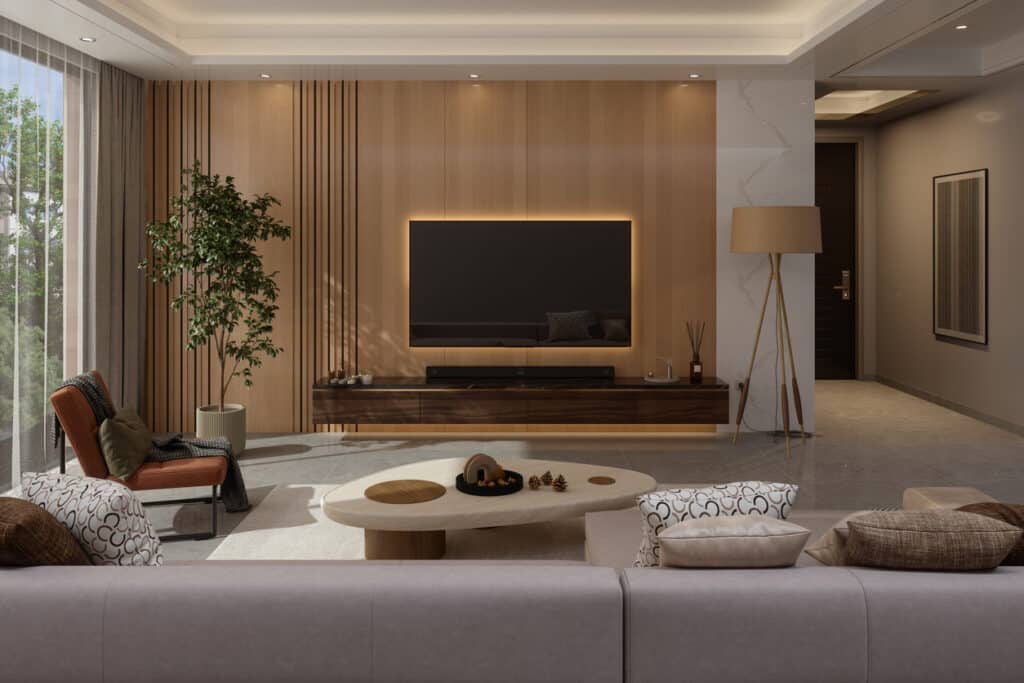 Recessed lighting in a living room with cove LED strip lighting and TV backlighting