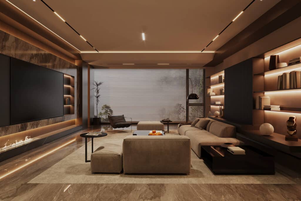 Modern living room lighting with track lighting and recessed ceiling lights creating warm ambient light.
