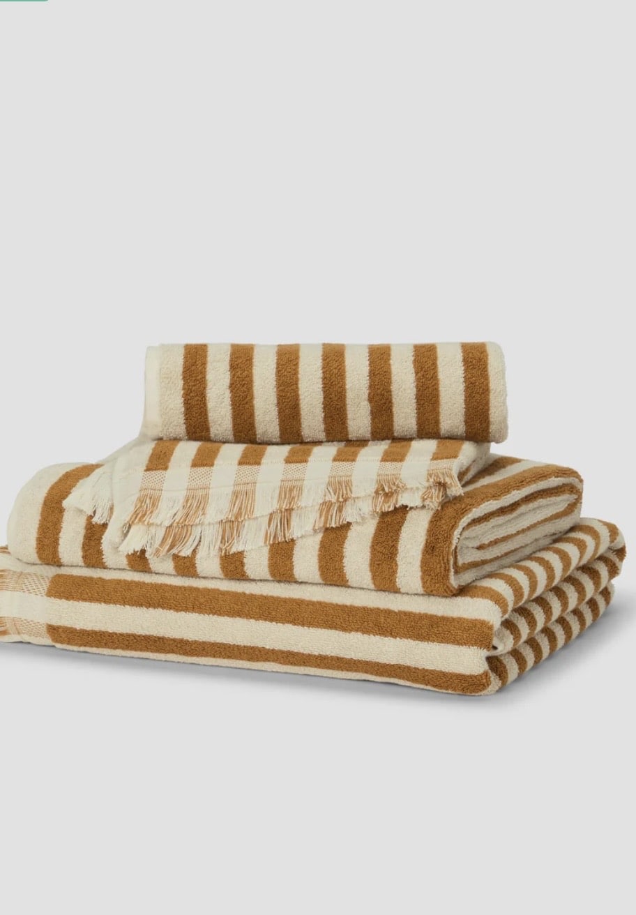 Russet and cream striped cotton towels for a neutral bathroom