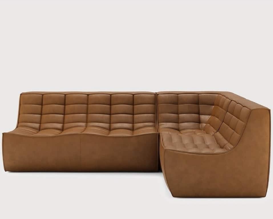 Ethnicraft 701 tan leather modular corner sofa — warm caramel leather for a modern living room