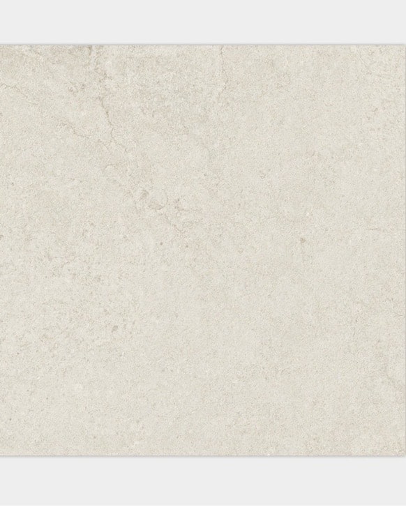 Porcelanosa Lamu Caliza stone-look porcelain tile for a neutral bathroom floor