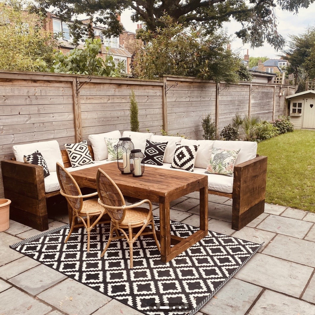 Budget corner garden sofa set with timber frame and dining table — affordable outdoor corner sofa