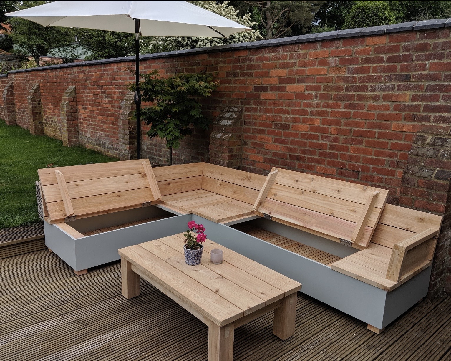 Outdoor corner sofa with lift-up storage benches — practical garden corner sofa set