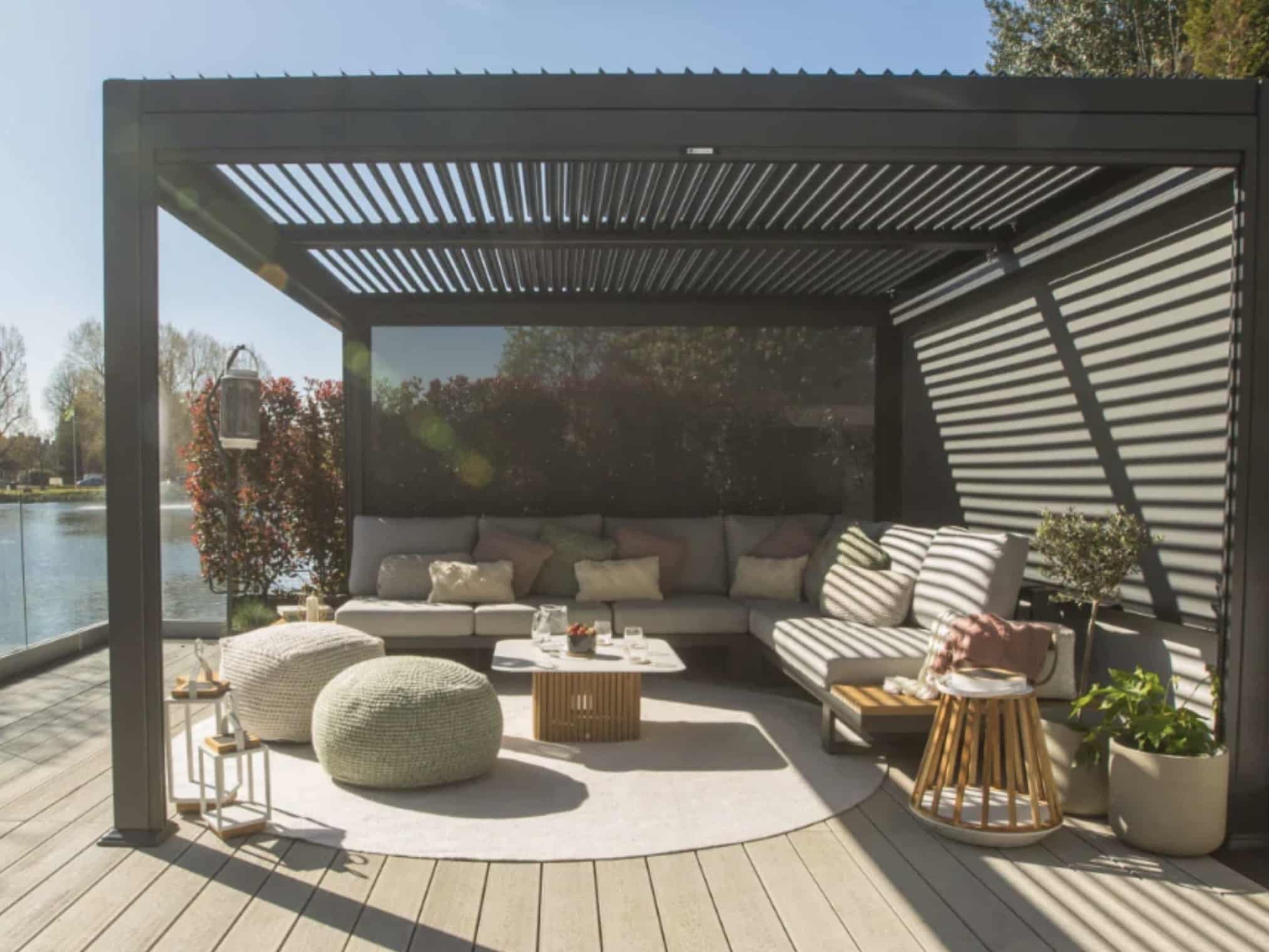 corner garden sofa under pergola with adjustable slats — outdoor corner sofa ideas, UK