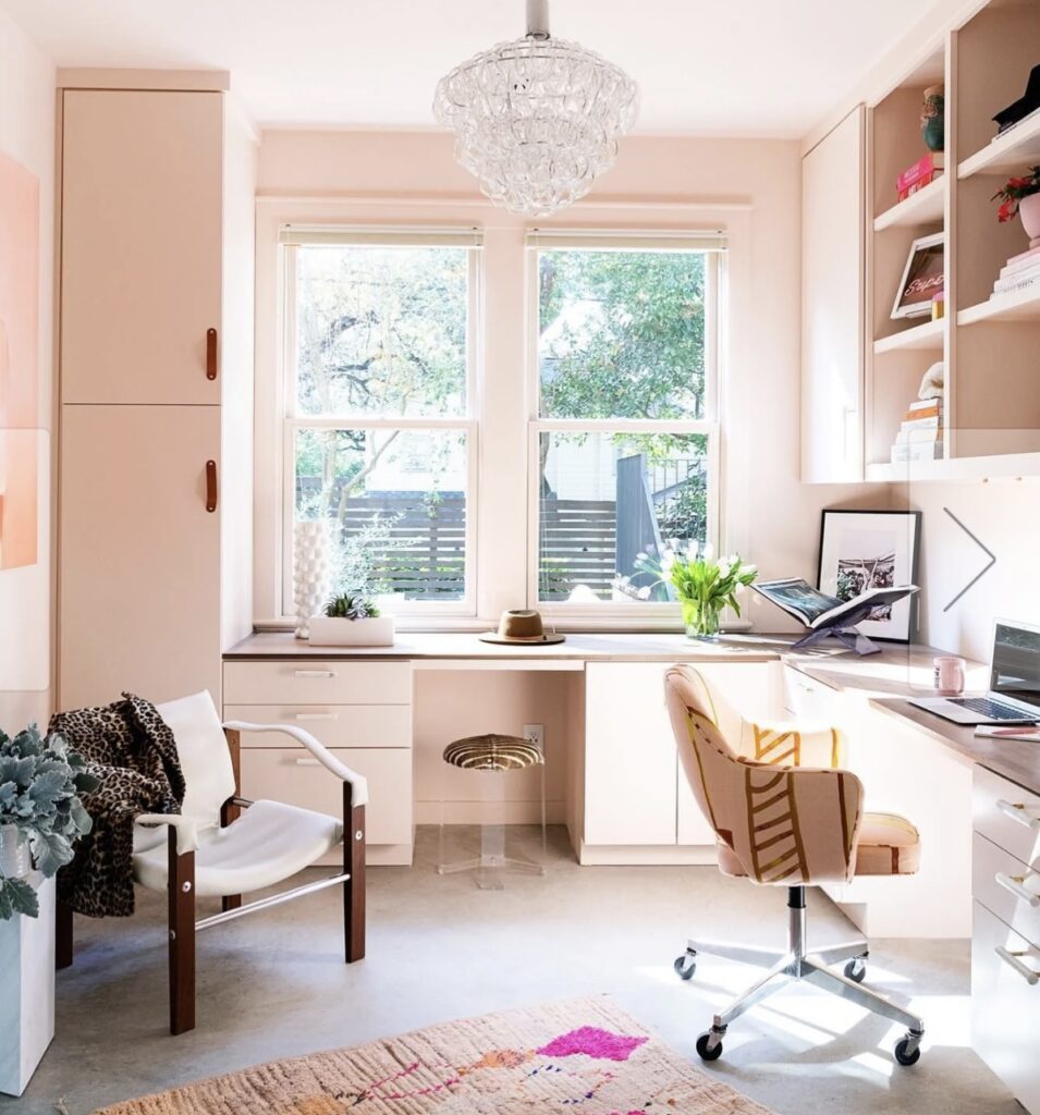 Modern home office ideas with built-in desk and fitted cabinetry painted in Farrow & Ball Pink Ground, designed by Alison Crawford.
