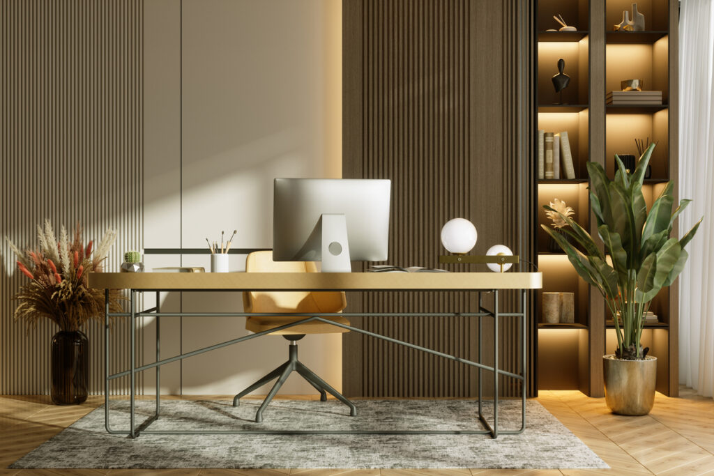 Luxury modern home office with warm layered lighting, lit shelving and minimalist desk