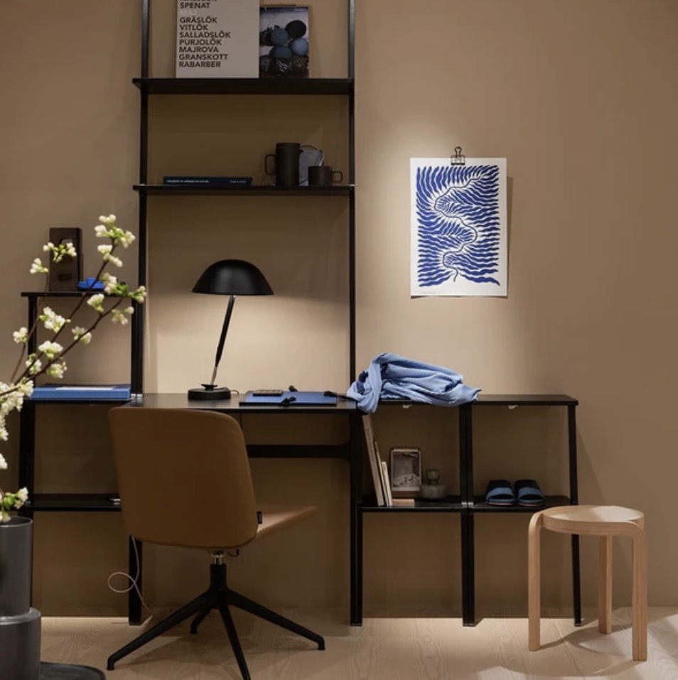 Modern home office ideas featuring the Swedese Libri Desk with shelving and a black desk lamp