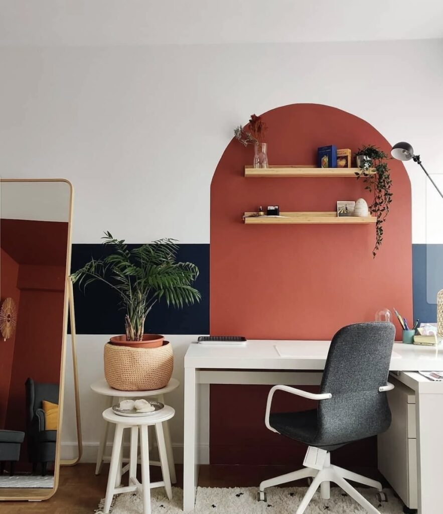 Farrow & Ball colour-blocked home office with a painted arch feature and balanced modern layout