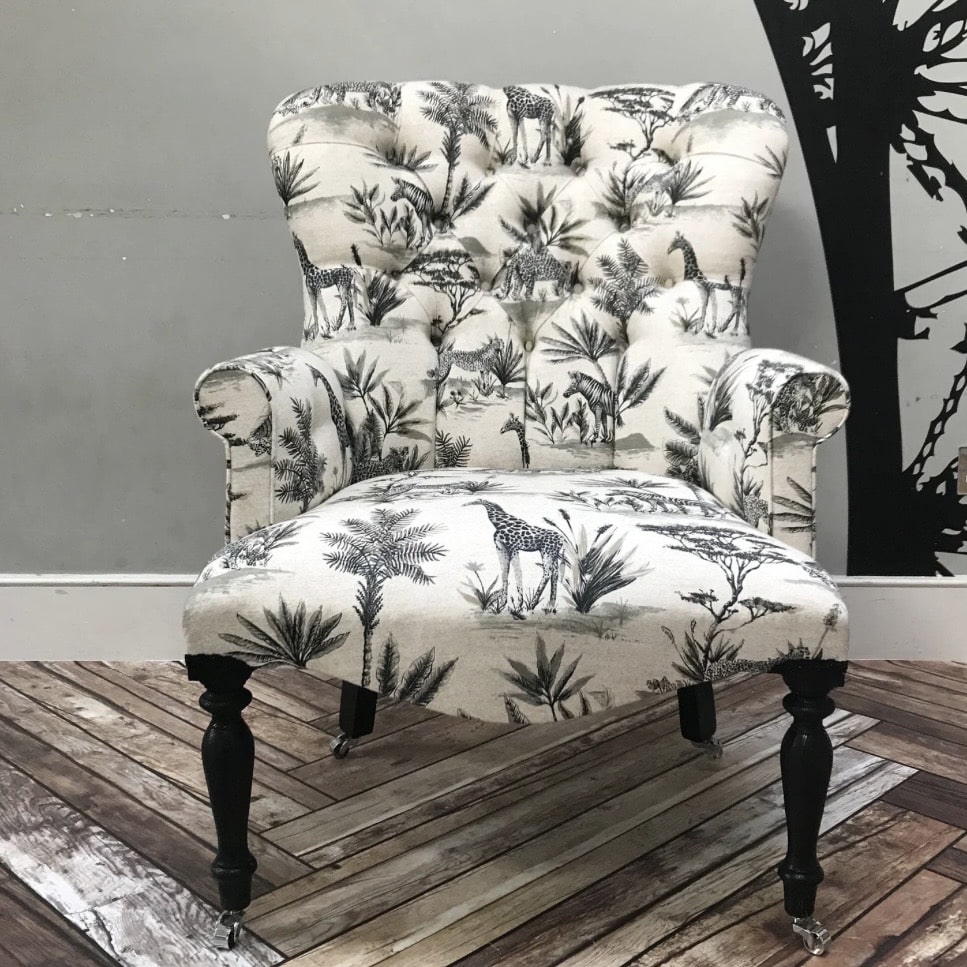Savannah Tropical Print Armchair with black and cream toile-style print