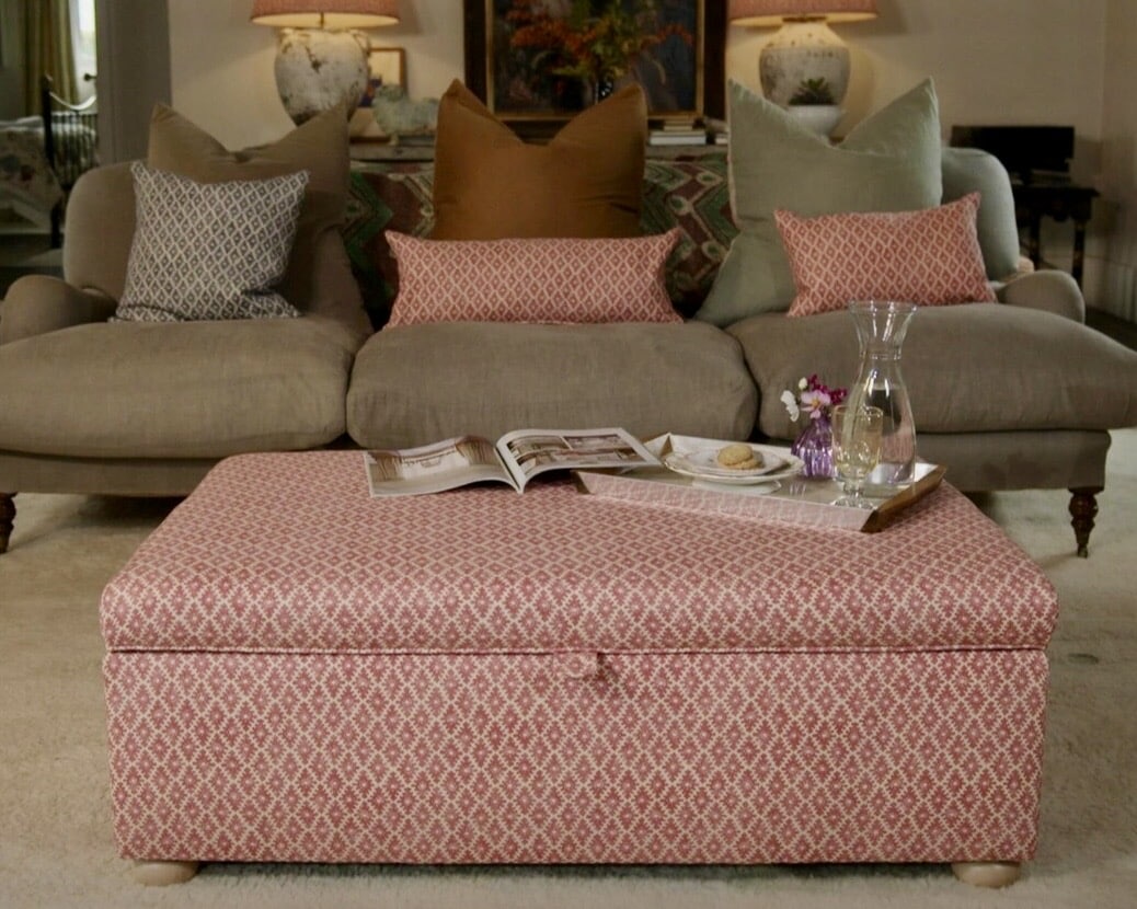 Modern living room storage ideas: storage ottoman coffee table styled in a living room