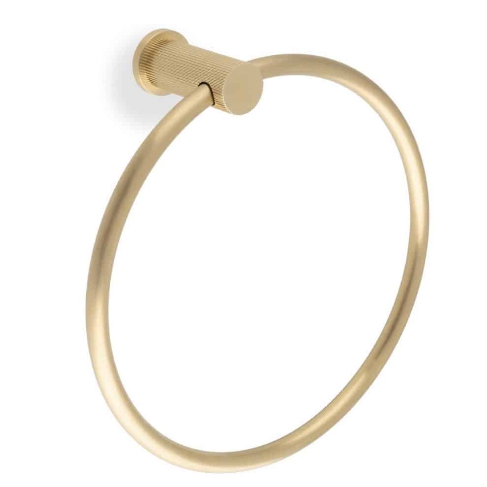 Brass towel ring for a moody green bathroom with brass fittings