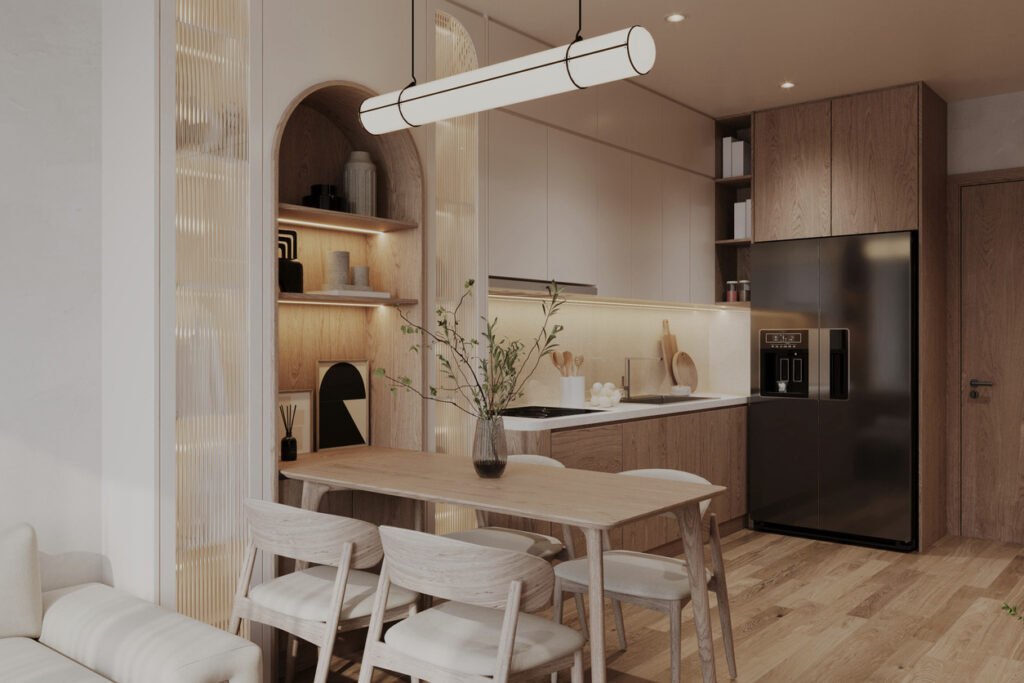 Warm modern kitchen diner with cream cabinets, wood units, arched built-in shelving and a small dining table beside the kitchen