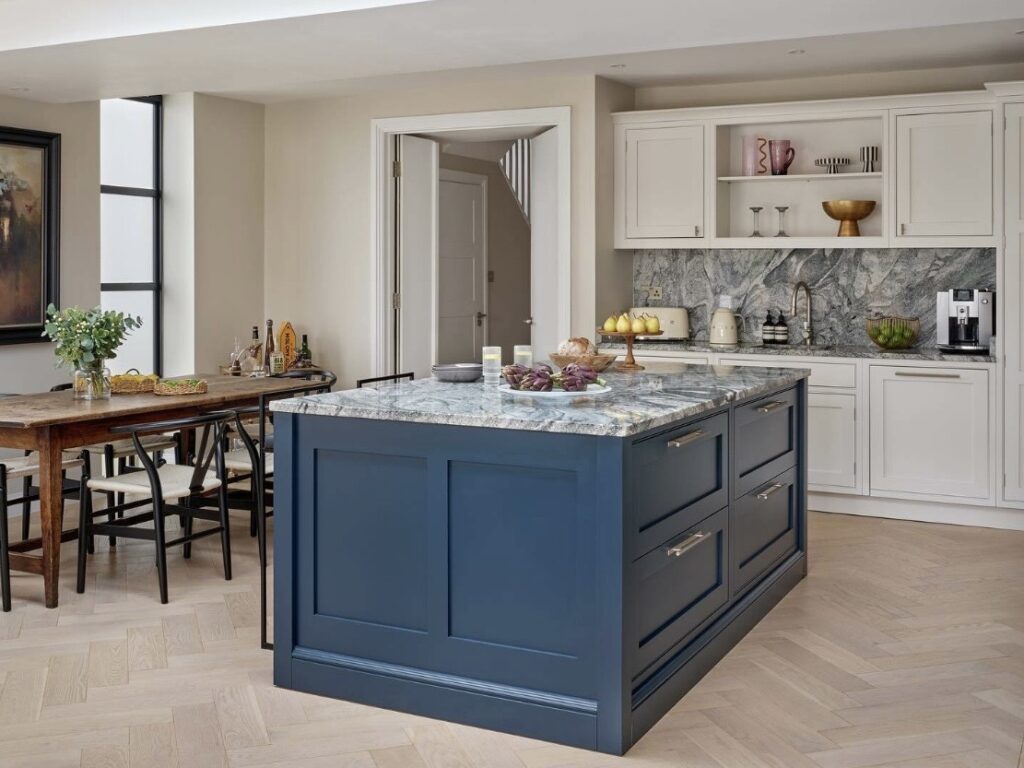 Blue kitchen dining room ideas with Hague Blue island, Strong White cabinetry and a wooden dining table