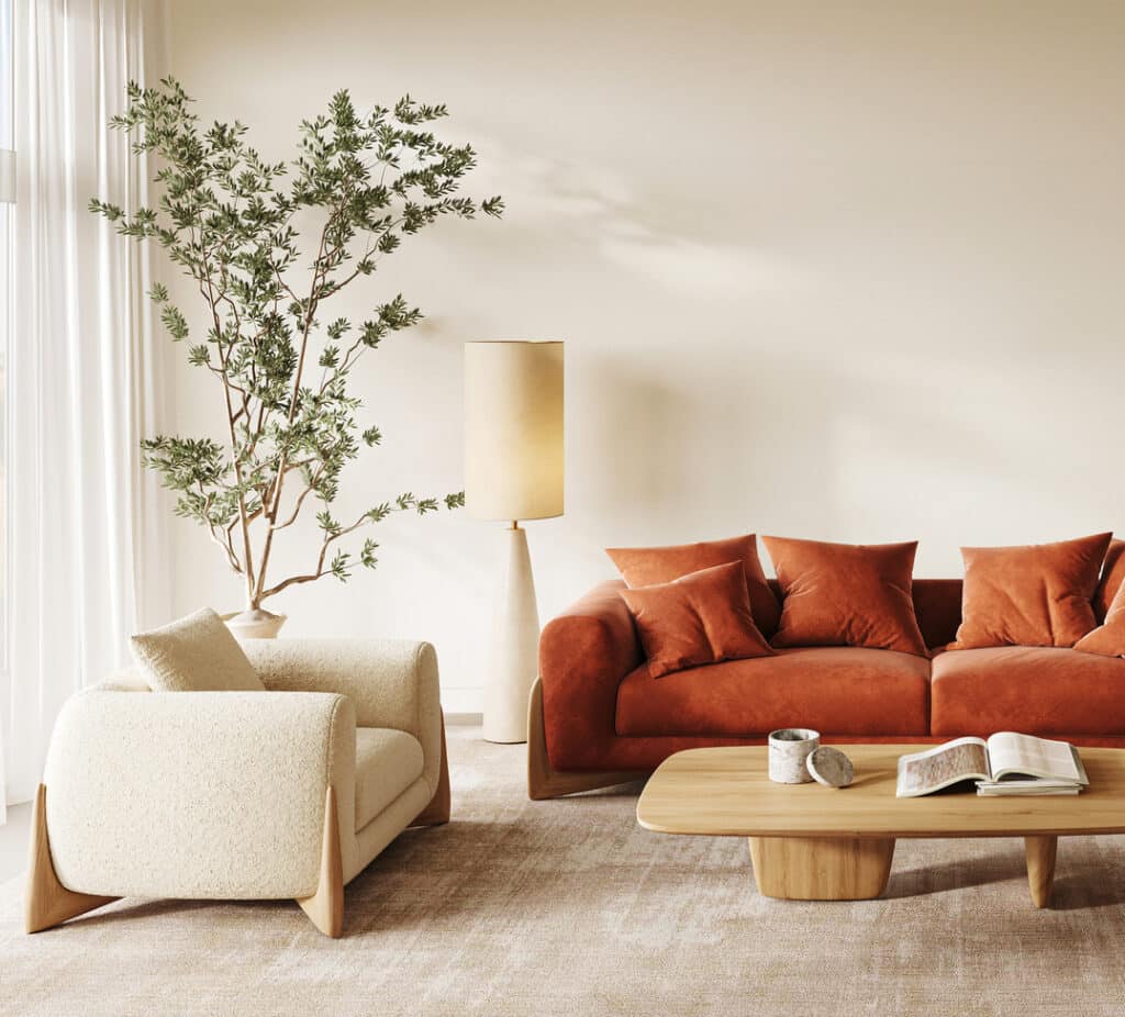 Burnt orange sofa creates a bright orange living room with simply the sofa.  a beige armchair, neutral rug and light wood coffee table, call the schème