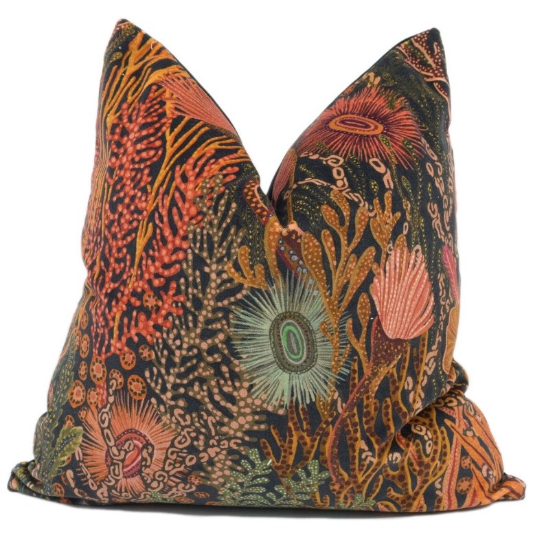 Harlequin Acropora orange patterned cushion with bold coral-inspired design