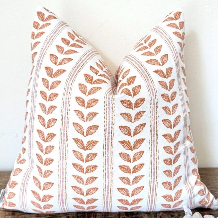 EMMY tangerine leaf stripe cushion in white and orange pattern
