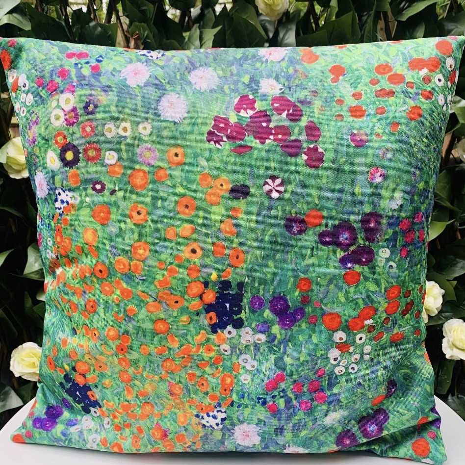 outdoor floral garden cushion in green and orange