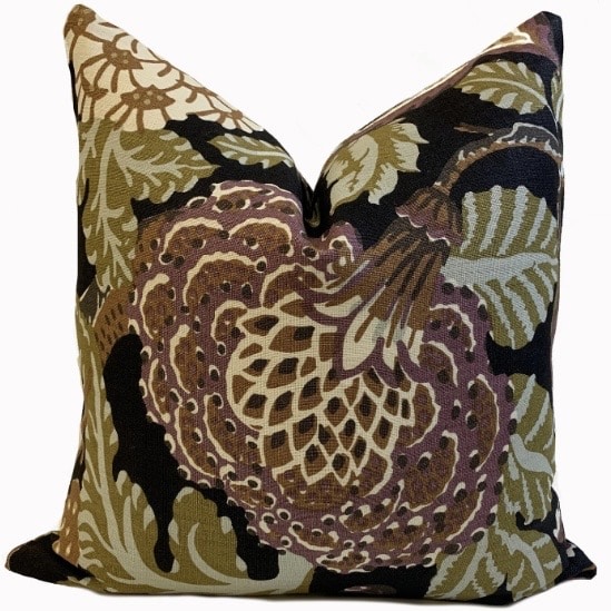 heritage-style black and beige cushion with warm floral print