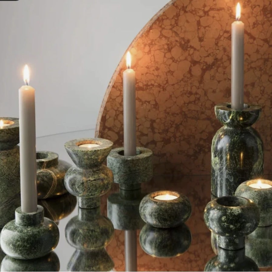 Green stone candleholder for a pink and green living room