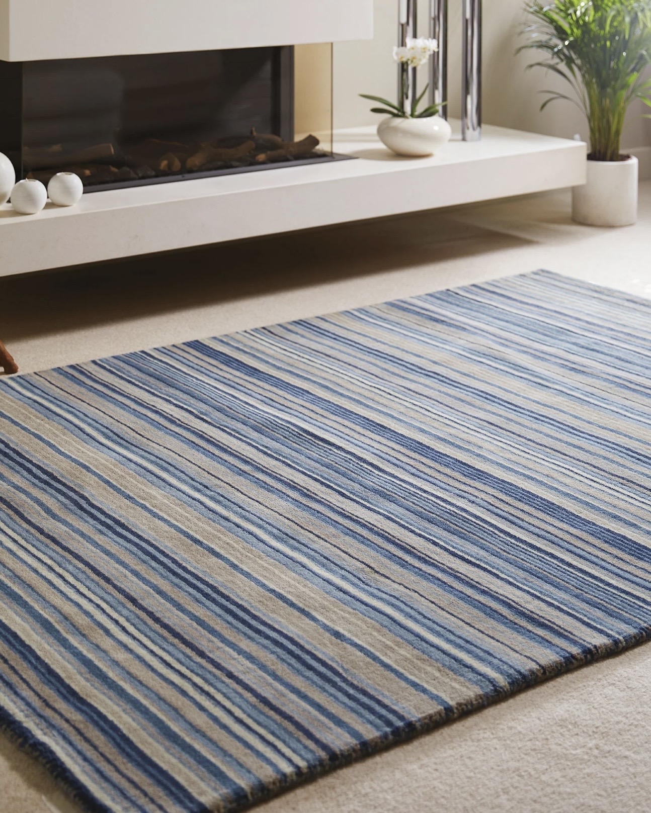 Fine Stripes Rug in blue and beige from Hug Rug for a coastal living room