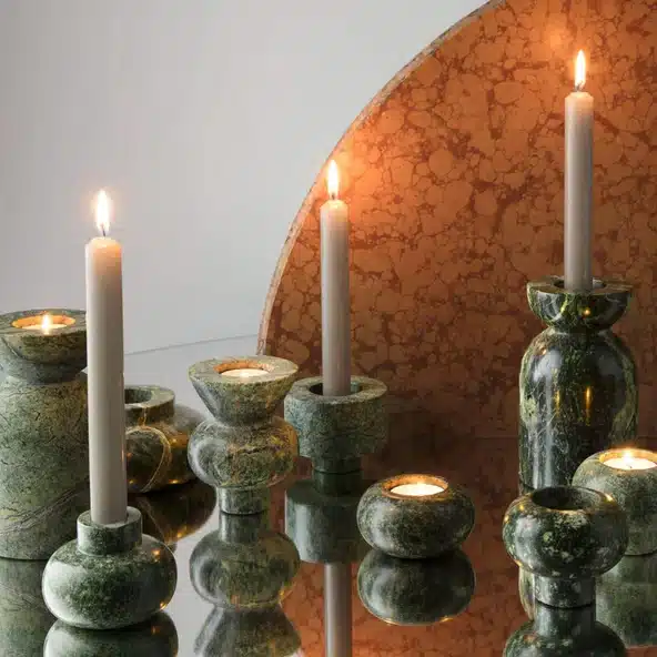 Tom Dixon Stone Stacking Candleholder green with taper candles and tealights as a dining table centrepiece styling idea