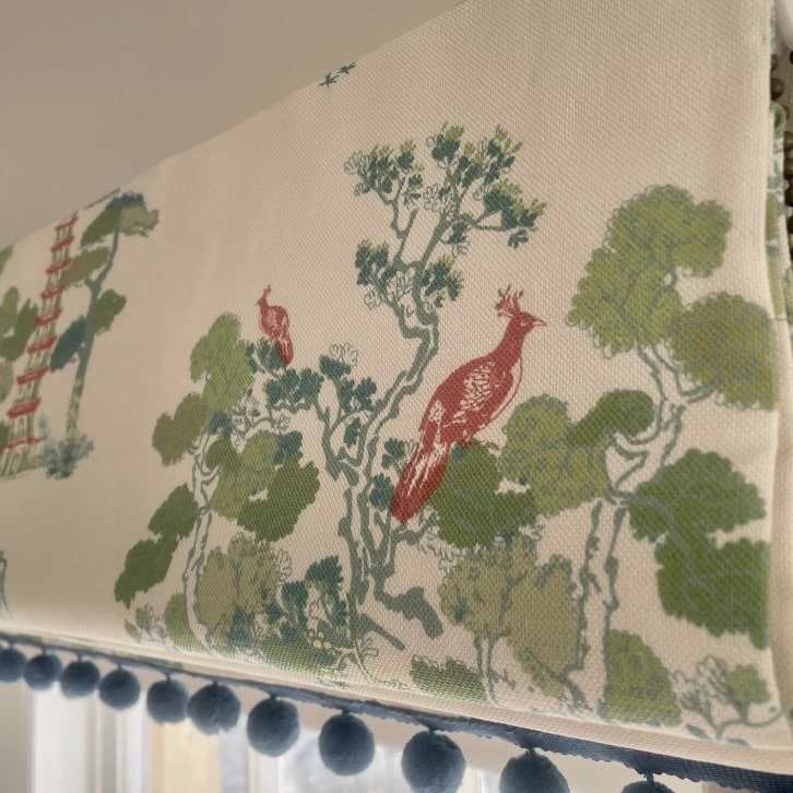 Charlotte Gaisford Dreaming Garden roman blind with chinoiserie print and pom pom trim