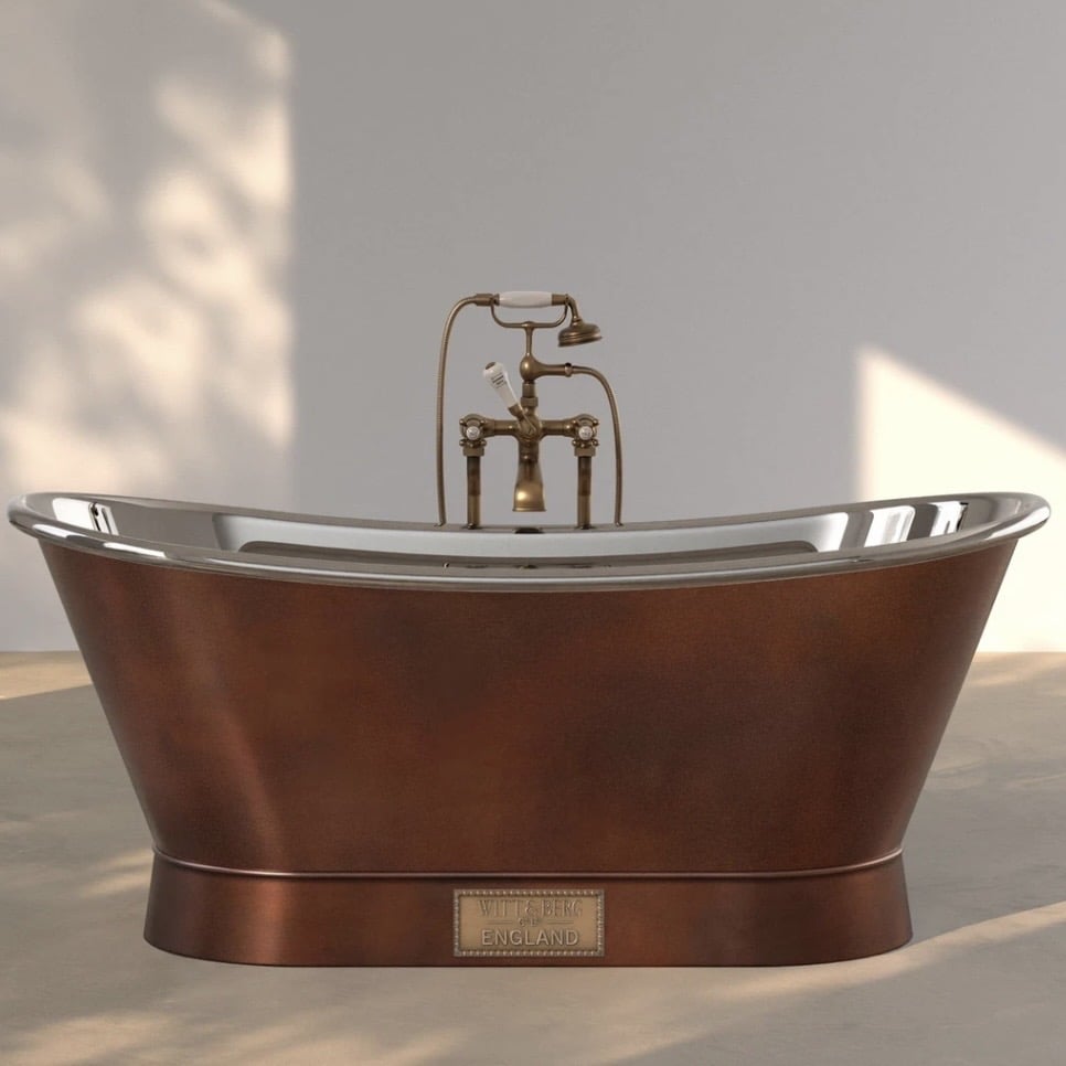 Copper freestanding bath in rustic green bathroom