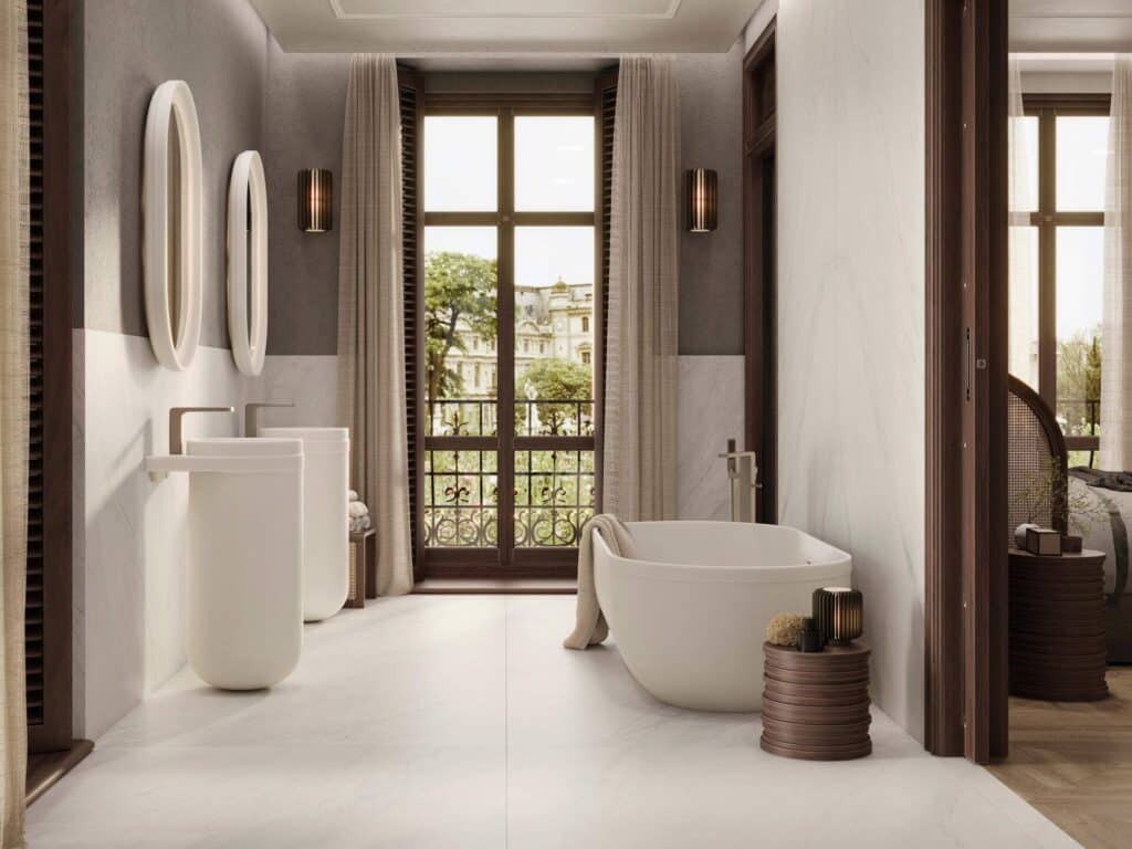 Glem White Nature 120x120 matte white marble bathroom with freestanding bath, twin pedestal basins and tall windows, Porcelanosa